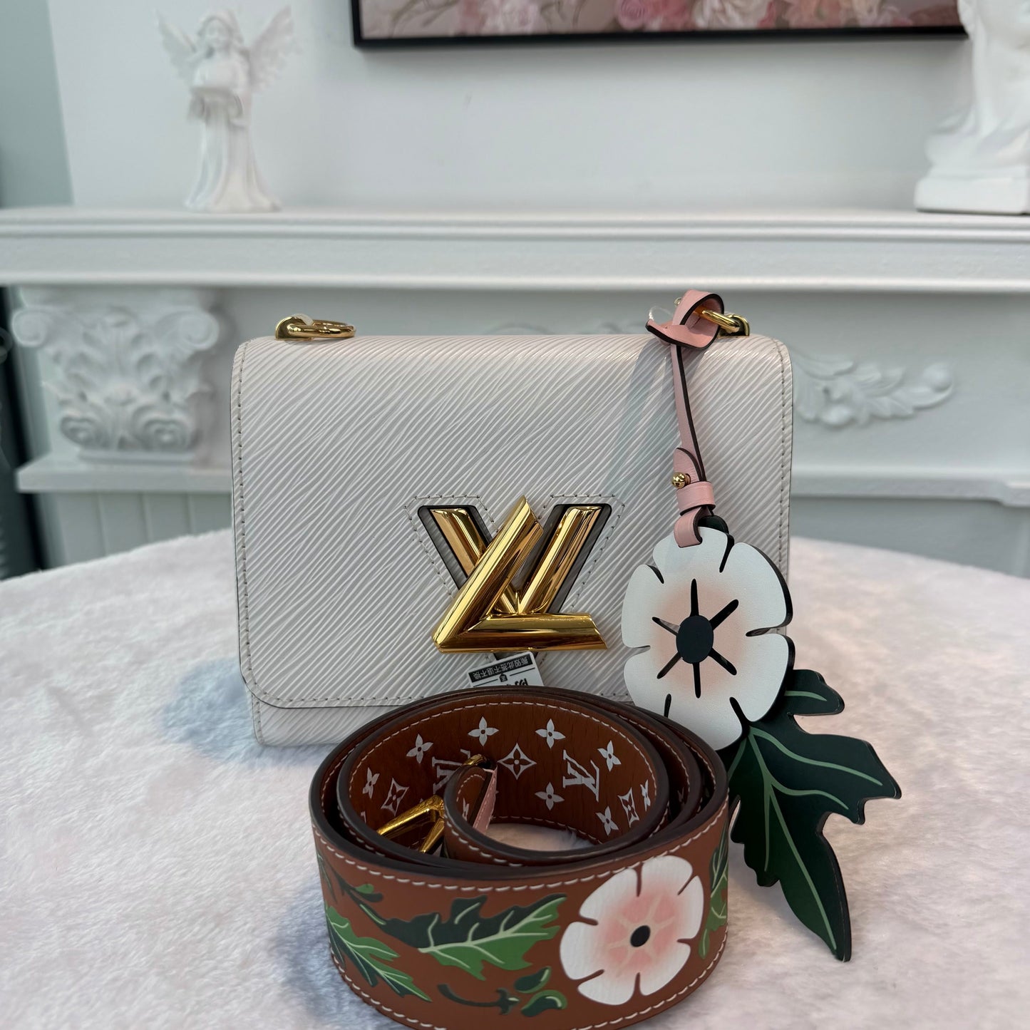 【#276】Pre-owned Louis Vuitton Twist MM Bag Epi Leather in White with Gold-Tone Hardware & Floral Bag Charm